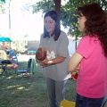 Shari (left with baby) and others
