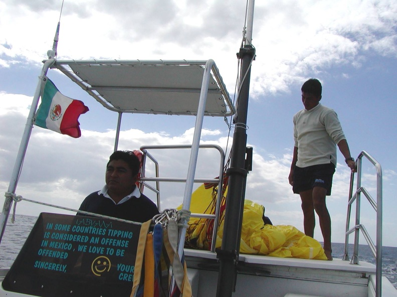 Enrique_Sergio_on_parasailing_boat.jpg