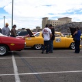 Car show the day before the race.  Please add comments to identify the cars and/or owners.
