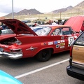 Car show the day before the race.  Please add comments to identify the cars and/or owners.