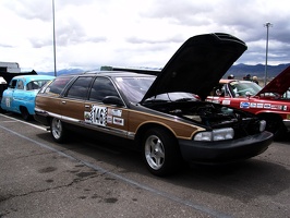 Car show the day before the race.  Please add comments to identify the cars and/or owners.