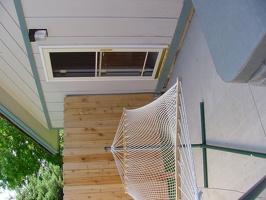 A better shot of the new screen door and light.  I'm working on a set of steps to go below that door.