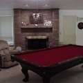 The finished living room.  I added the pool table and replaced the fireplace doors.