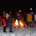 Unknown people at the bonfire
